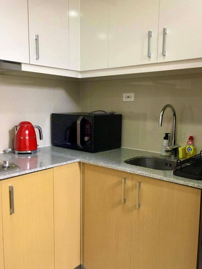 Daniella'S Modern & Cozy Suite In Uptown Bgc Манила Экстерьер фото
