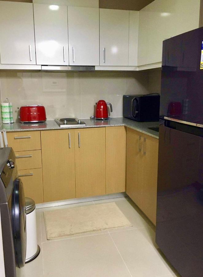 Daniella'S Modern & Cozy Suite In Uptown Bgc Манила Экстерьер фото