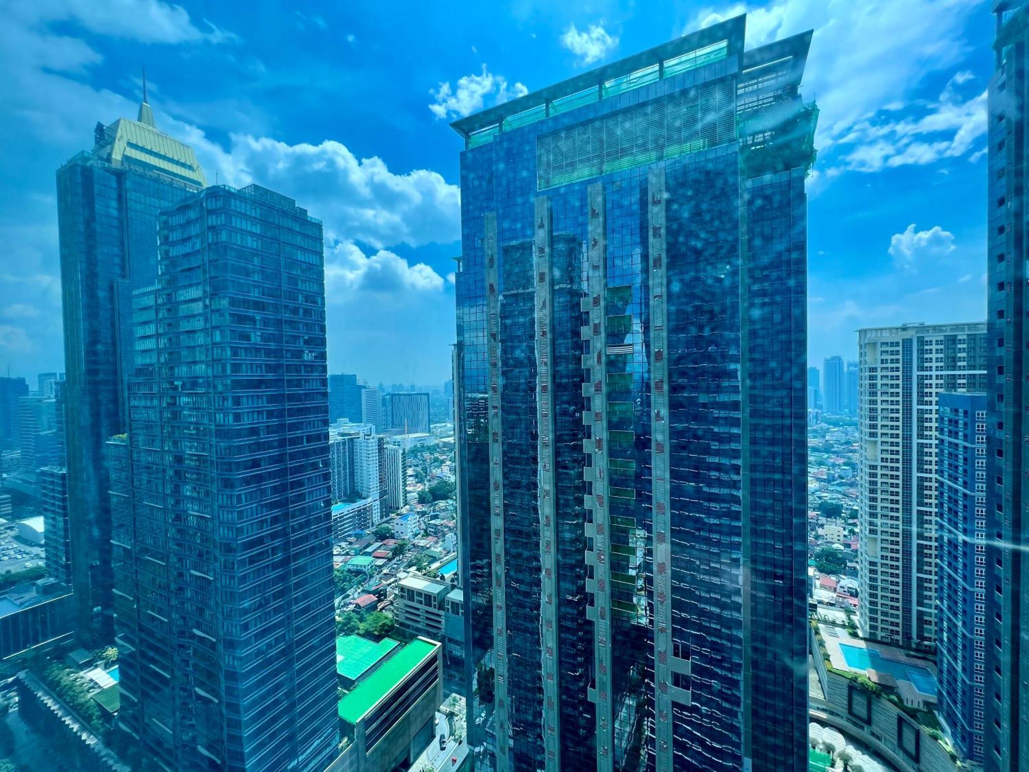 Daniella'S Modern & Cozy Suite In Uptown Bgc Манила Экстерьер фото